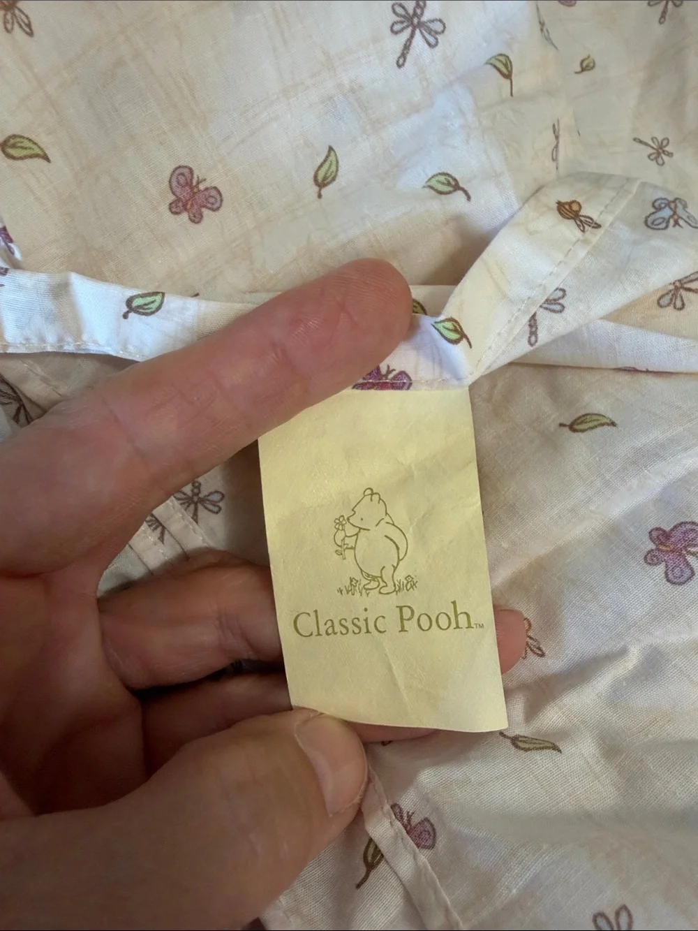 Set of Pooh bedding, crib sheet and dust ruffle